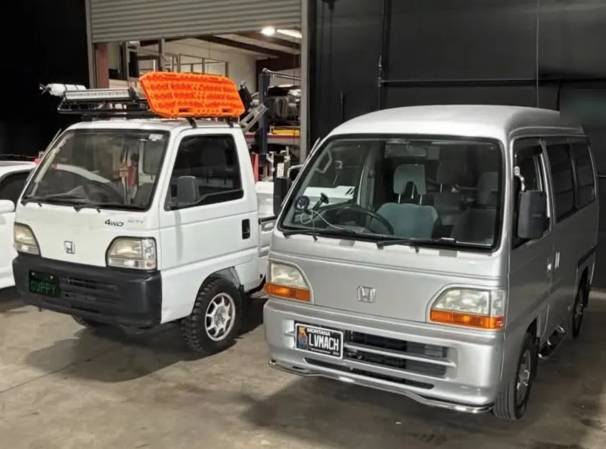 Tri-Valley Clean’s white Honda Acty mini truck and silver Honda Acty van parked side by side