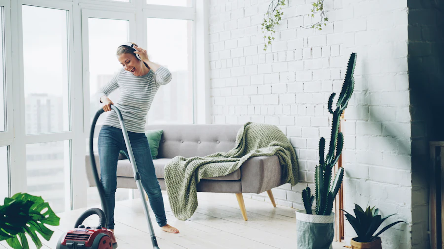 Cleaner vacuuming a living room
