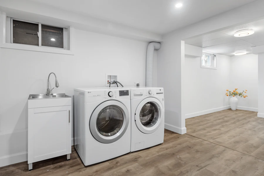 Clean laundry room with washer and dryer