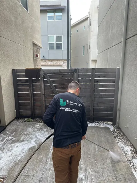 Pressure washing a side patio