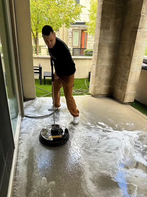 Pressure washing a covered patio