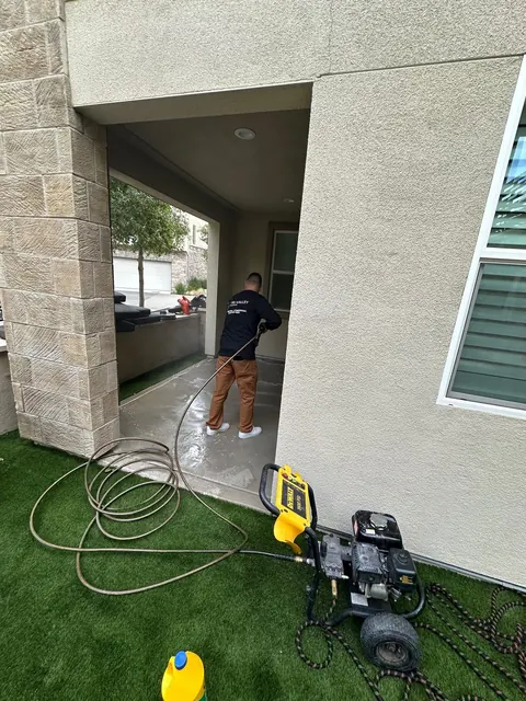 Pressure washing a covered patio