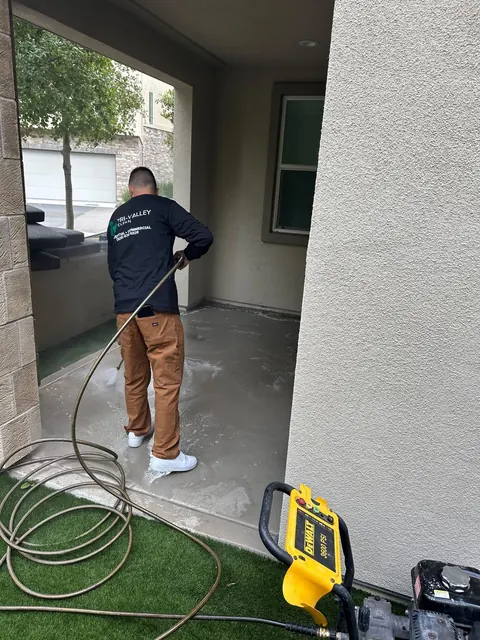 Pressure washing a covered patio