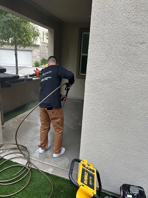 Rinsing a covered patio