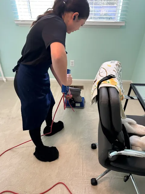 Vacuuming during a home cleaning