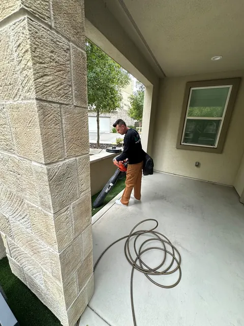 Clearing a covered patio with a blower