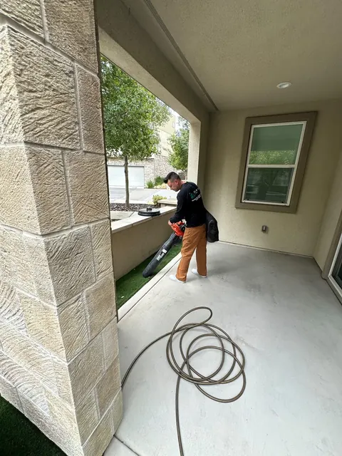 Clearing a covered patio with a blower