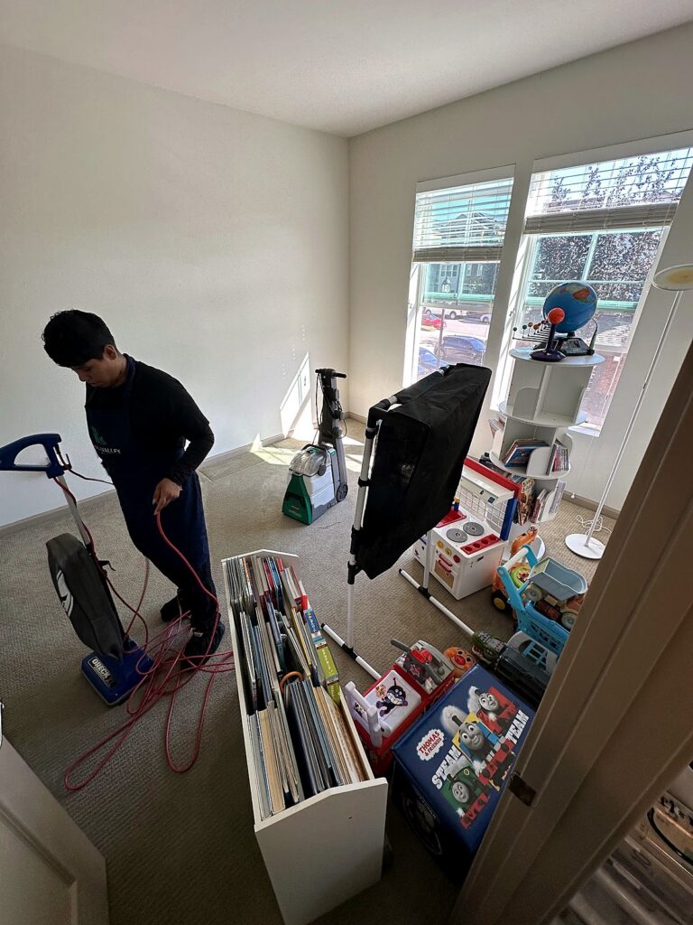 Carpet cleaning in progress in a family home