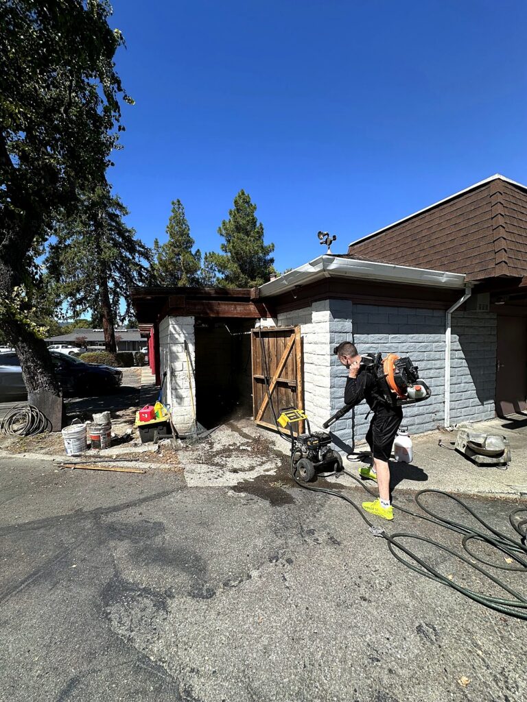 Pressure washing a commercial patio