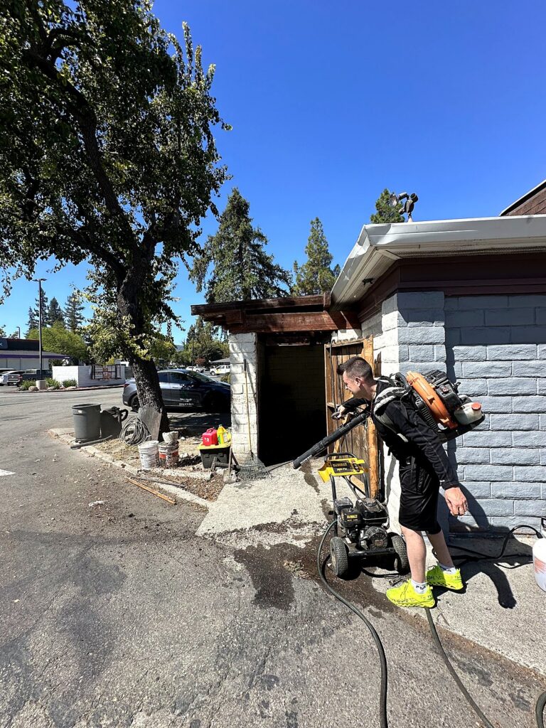 Tri-Valley Clean team pressure washing outdoor surfaces