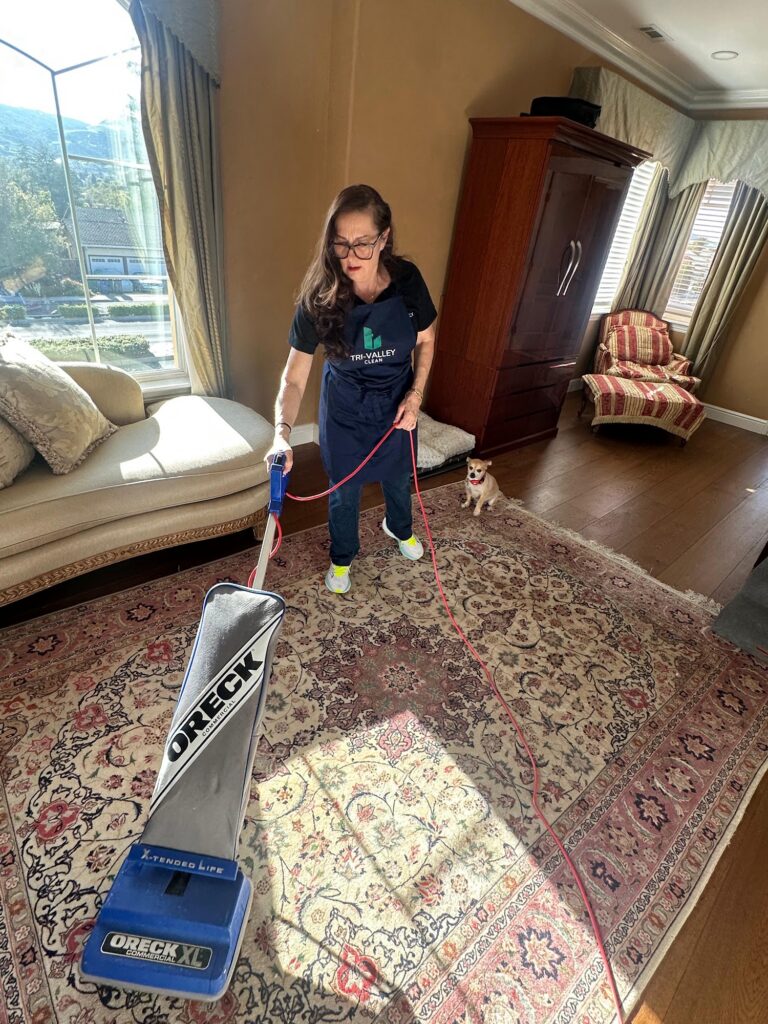 Tri-Valley Clean team member cleaning a client home